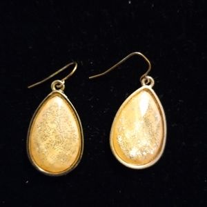 Peach with gold accent.